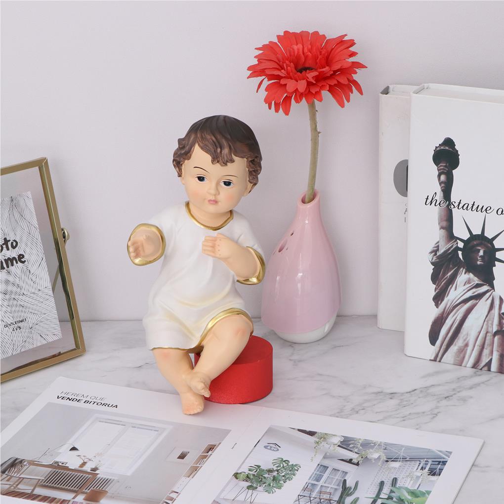 Statuetta natalizia in resina  - Baby Bookshelf Small recensione e prezzo